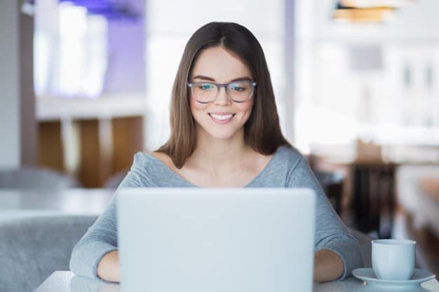 Young lady enjoying time spent on the internet